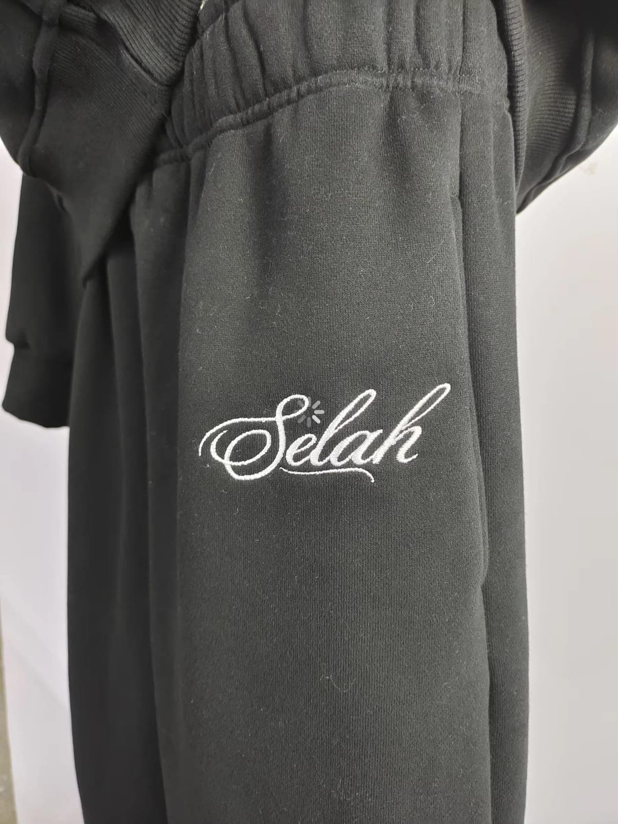 Close view of the Selah hip embroidery