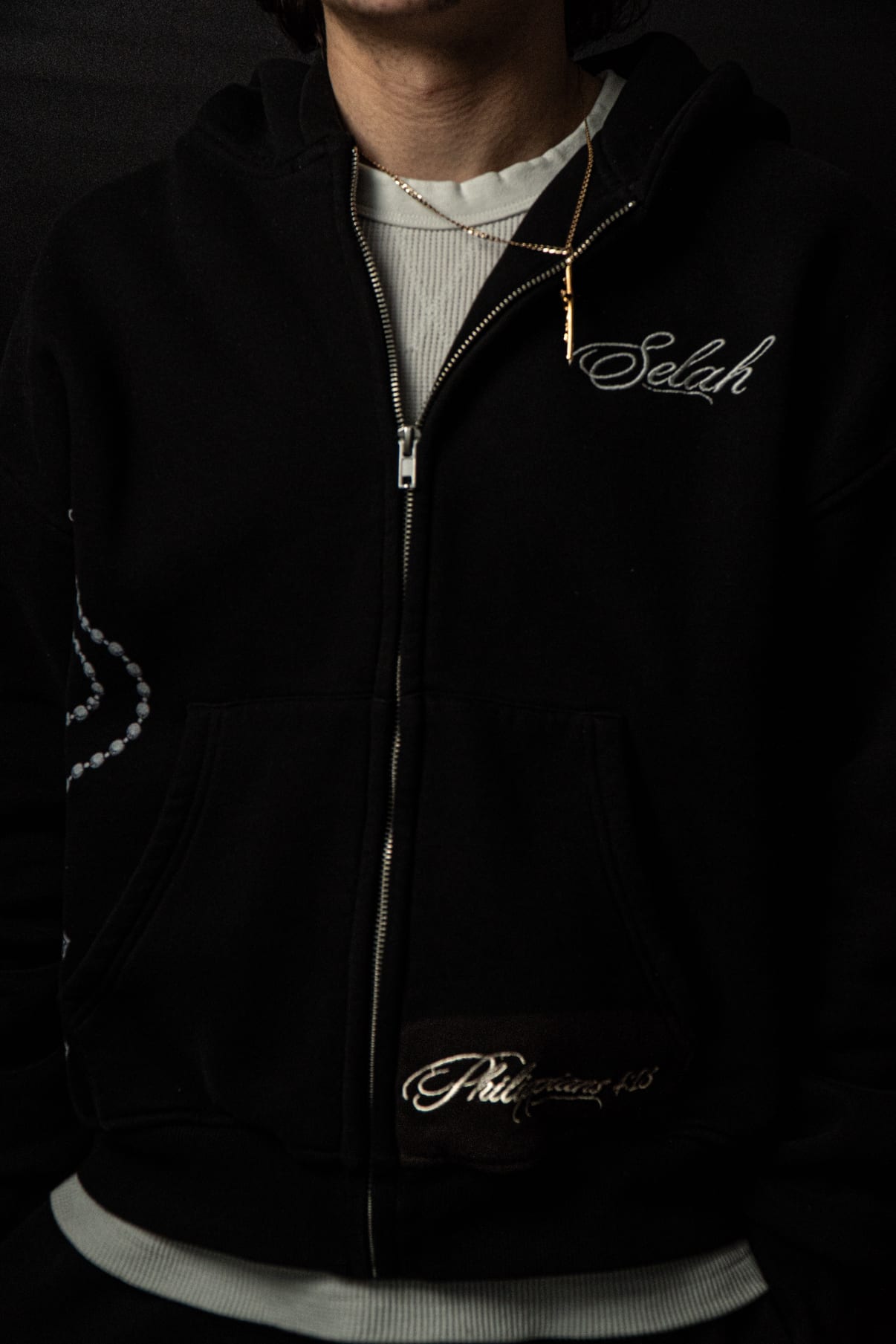 Rosary Zip Hoodie styled with a gold crucifix chain