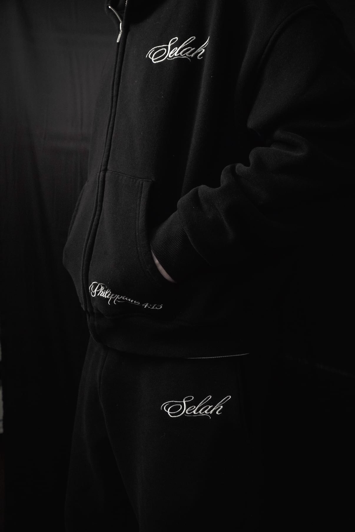 Side profile of the Rosary Zip Hoodie